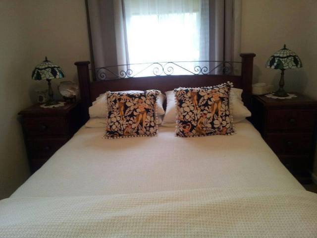 Cushy cushions on bed